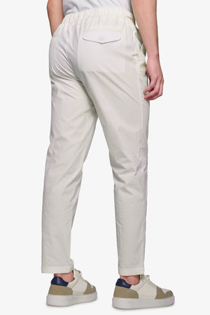 Pantalón técnico DNJ color blanco roto