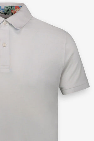 White yarn-dyed floral under collar polo shirt