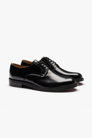 Chaussures derby classiques à semelle en cuir noir